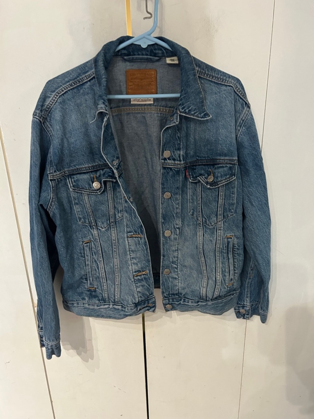 Levi's light blue denim jacket with brown leather patch